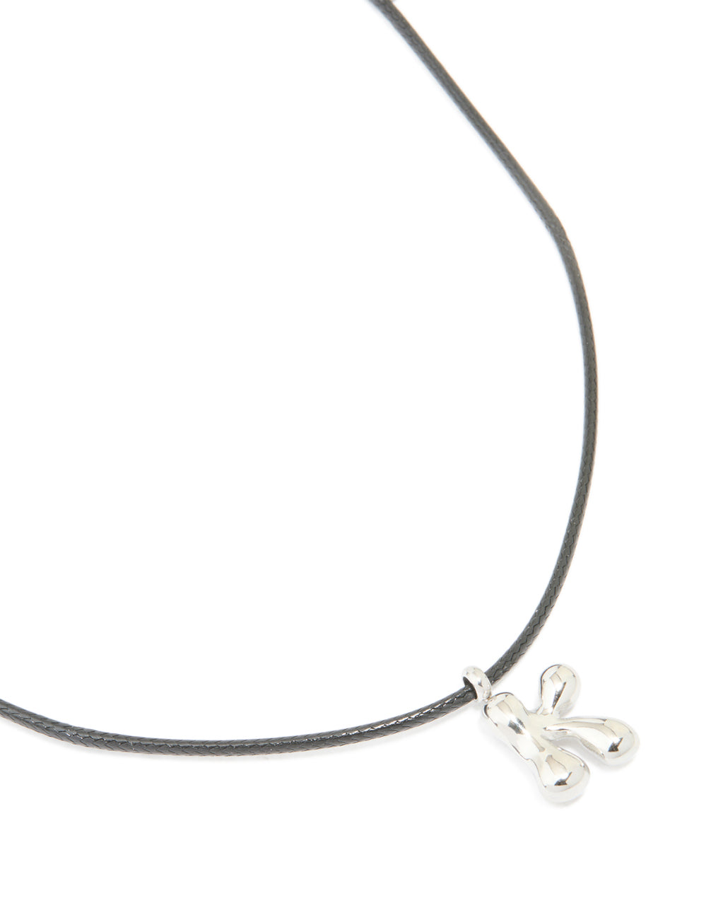 Crafted from waterproof stainless steel and cord, this dainty necklace features a large bubble letter K initials pendant close up view