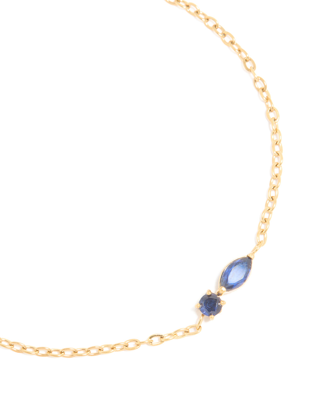 Crafted from waterproof gold plated stainless steel September blue cubic zirconia birthstone bracelet close up view