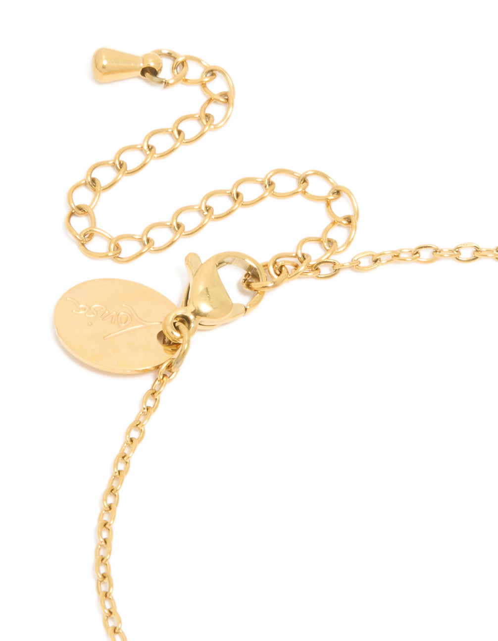 Showcasing waterproof gold plated stainless steel construction, this November birthstone bracelet reveals lobster clasp and adjustable chain with cubic zirconia closure detail view