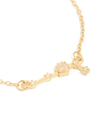 Displaying a waterproof celestial bracelet with gold plated stainless steel and cubic zirconia star sign close up view - link has visual effect only