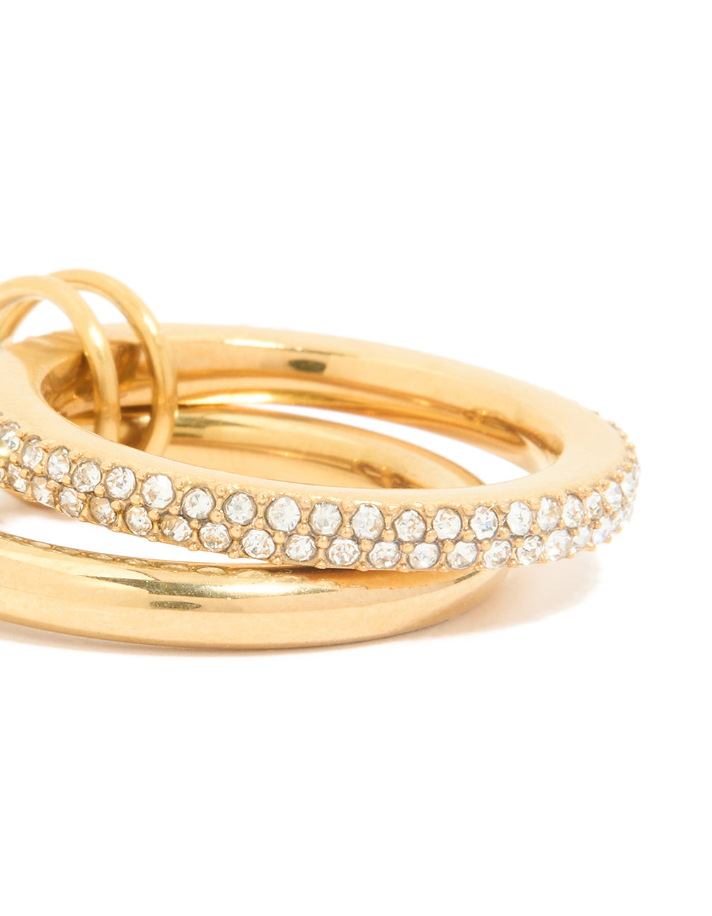 Highlighting waterproof gold plated stainless steel cubic zirconia spinner rondell stacked ring close up view