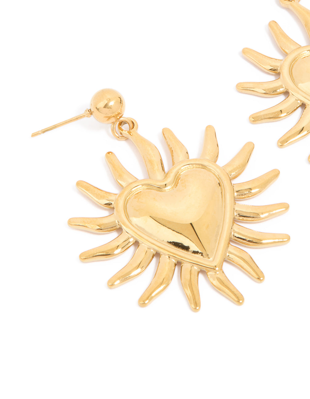 Highlighting statement earrings with celestial and heart motifs crafted from waterproof gold plated stainless steel close up view