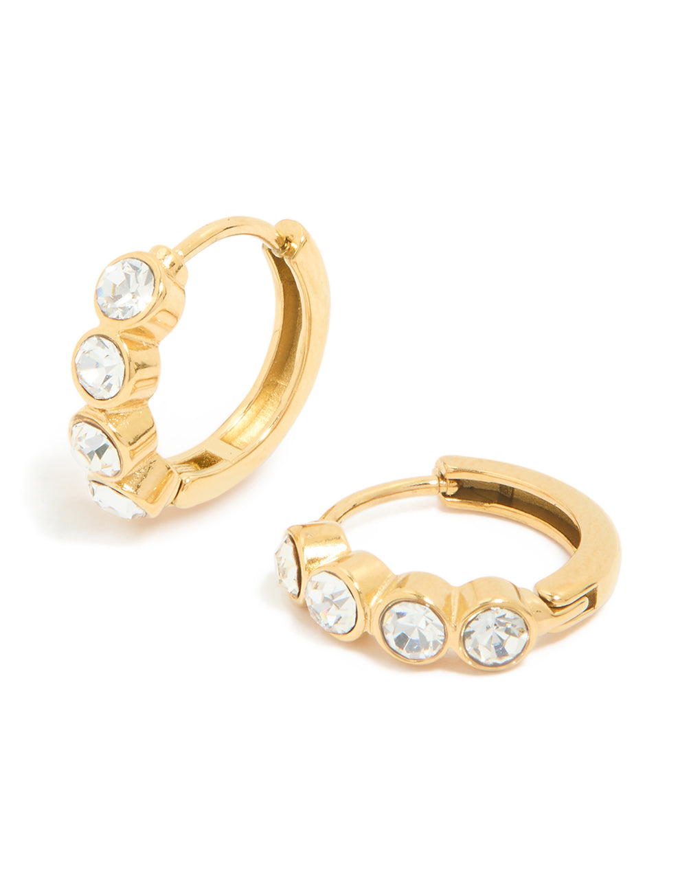 Showcasing waterproof gold plated stainless steel cubic zirconia bezel huggie earrings with clear accents front view