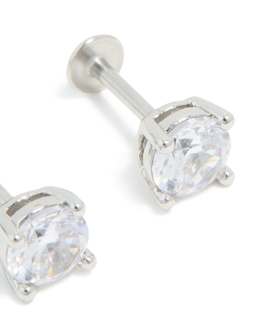 Detailed titanium cubic zirconia flat back studs highlighting post closure and prong setting post detail view