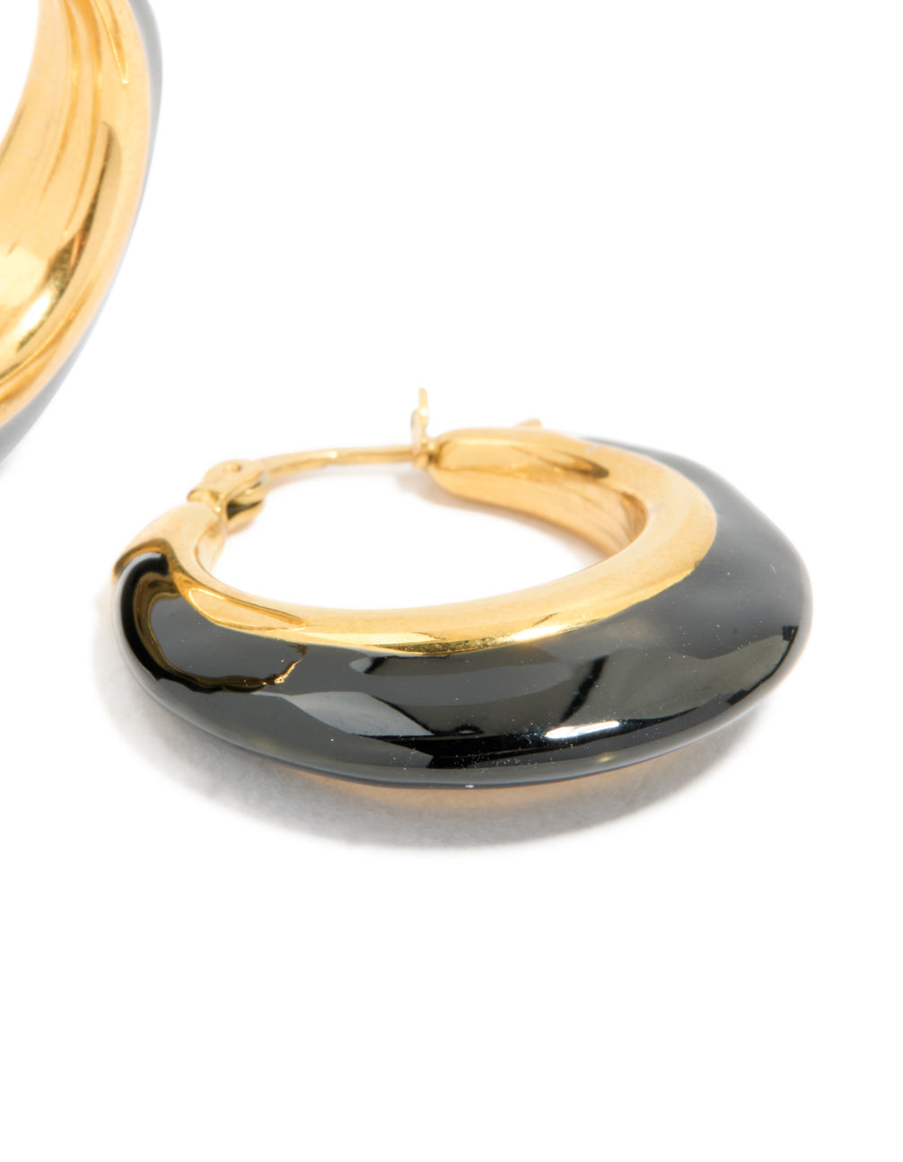 Designed with waterproof gold plated stainless steel and black enamel short hoop earrings in post detail view