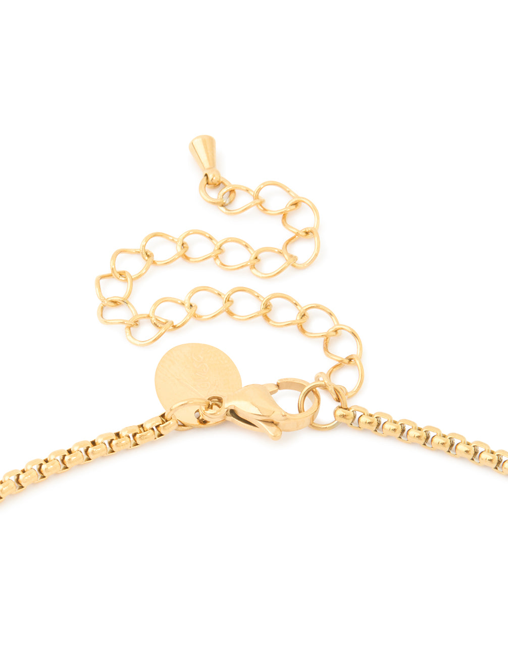 A waterproof cross necklace showcasing cubic zirconia pavé detailing in gold plated stainless steel clasp detail view