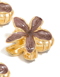 Designed with small brown frangipani flower claw clips in gold side view - link has visual effect only