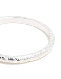 Highlighting sterling silver molten ring in close up view - link has visual effect only