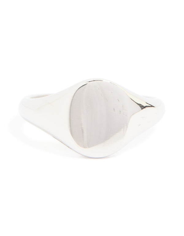 This mens waterproof stainless steel oval signet ring in silver with statement style close up view