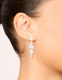 Showcasing silver plated cubic zirconia vine medium drop earrings with leaf design on ear view - link has visual effect only