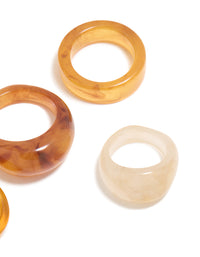 Showcasing chunky statement rings with marble pattern in wheat brown gold and beige, acrylic cigar bubble 6-pack close up view - link has visual effect only