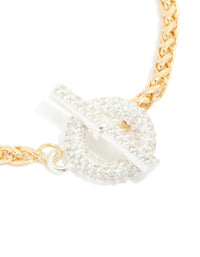Detailed view of mixed metal plated cubic zirconia T and O chain bracelet highlighting toggle closure and sparkling stones with gold and silver plating close up view - link has visual effect only