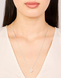 Elegant waterproof stainless steel mini bubble letter O necklace featuring initial pendant in dainty silver on neck view - link has visual effect only