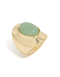 Designed with gold plated material and an oval pale green semi precious stone front view - link has visual effect only