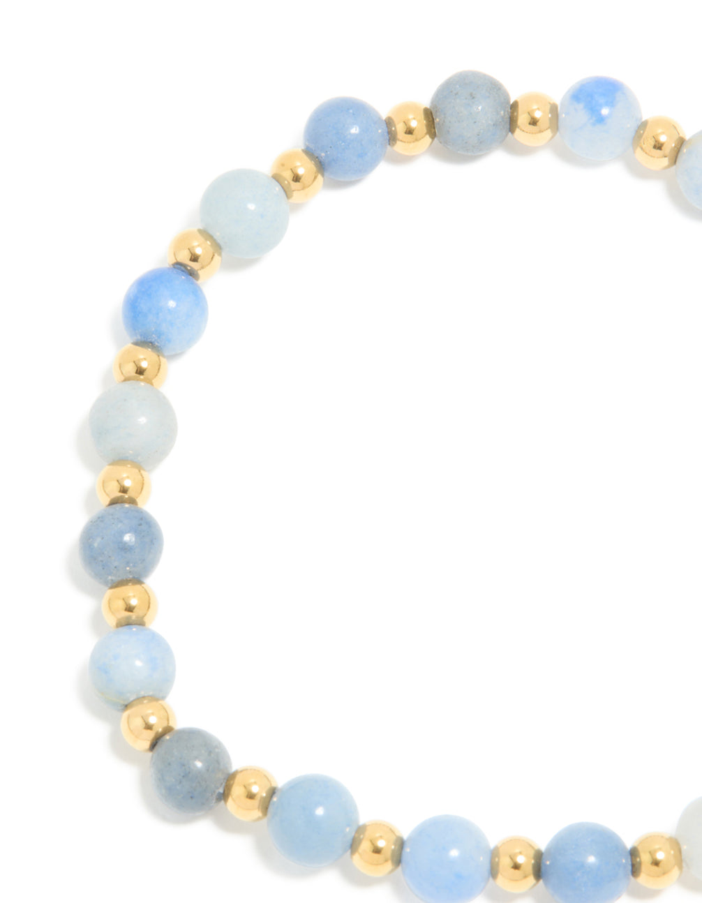 Showcasing a waterproof gold plated stainless steel blue beaded stretch bracelet with light and powder tones in a dainty style close up view