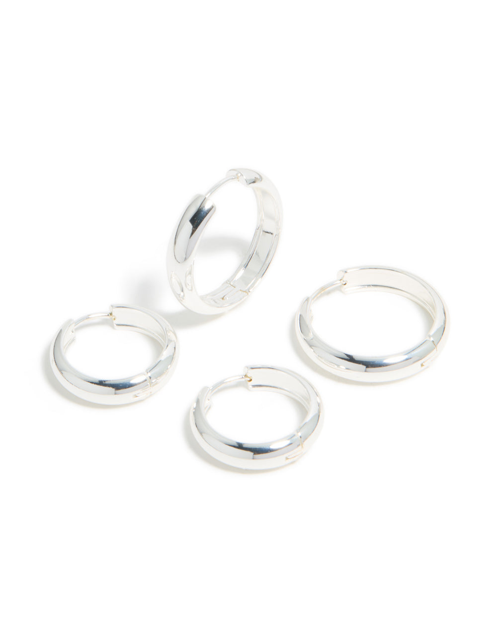 Featuring chunky waterproof stainless steel thick hoop earrings in silver in a 2-pack with a front view