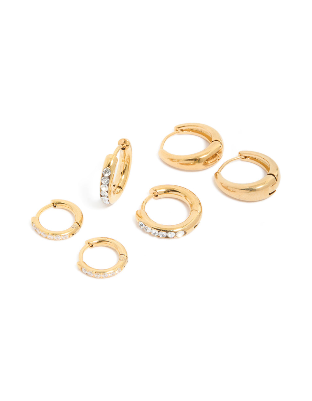 Showcasing these waterproof stainless steel pavé and plain huggie earrings in a 3-pack set with gold plating in a front view