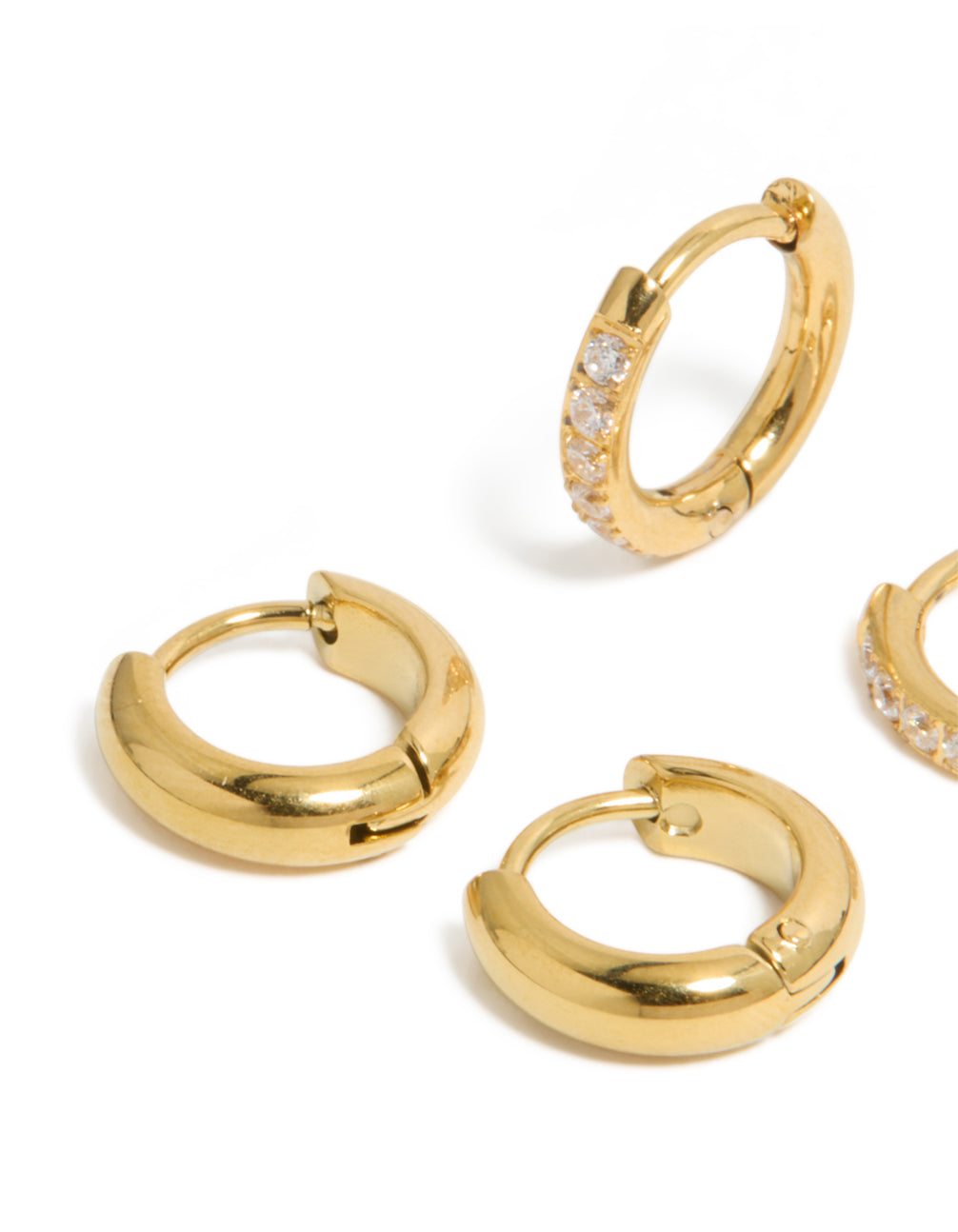 Featuring waterproof gold plated stainless steel cubic zirconia pavé and plain huggie earrings in a 2-pack close up view