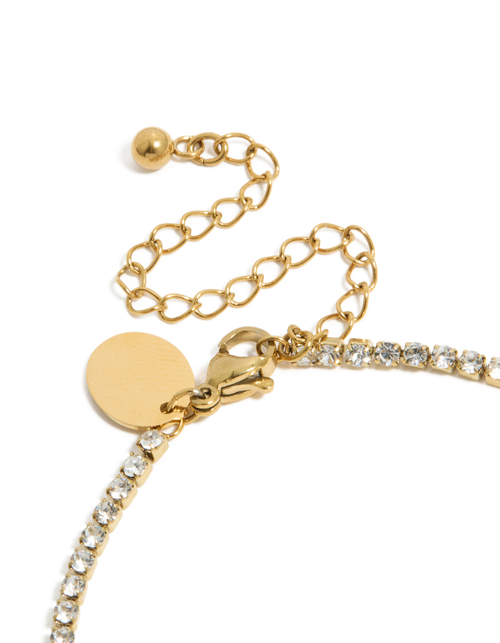Highlighting the waterproof tennis bracelet with initial letter E in gold plated stainless steel featuring cubic zirconia in closure detail view
