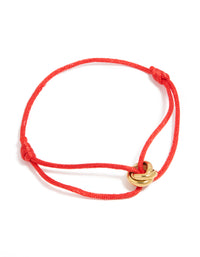 Showcasing a waterproof adjustable bracelet with gold plated stainless steel and red cord front view - link has visual effect only