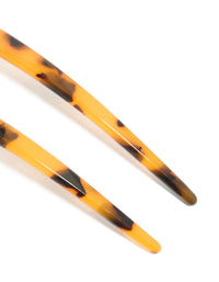 Crafted from tortoiseshell acrylic, this large basic hair pin features animal-leopard print in goldenrod, chocolate, and black detail view - link has visual effect only