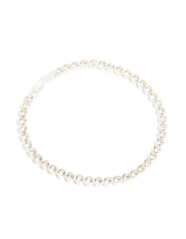 Showcasing a silver plated diamante tennis bracelet with continuous crystal embellishments front view