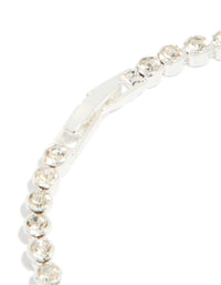 Designed with a silver plated diamante tennis bracelet showcasing clasp mechanism closure detail view - link has visual effect only