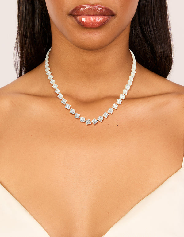 Elegantly designed silver plated cubic zirconia multi flower necklace in statement style on neck view