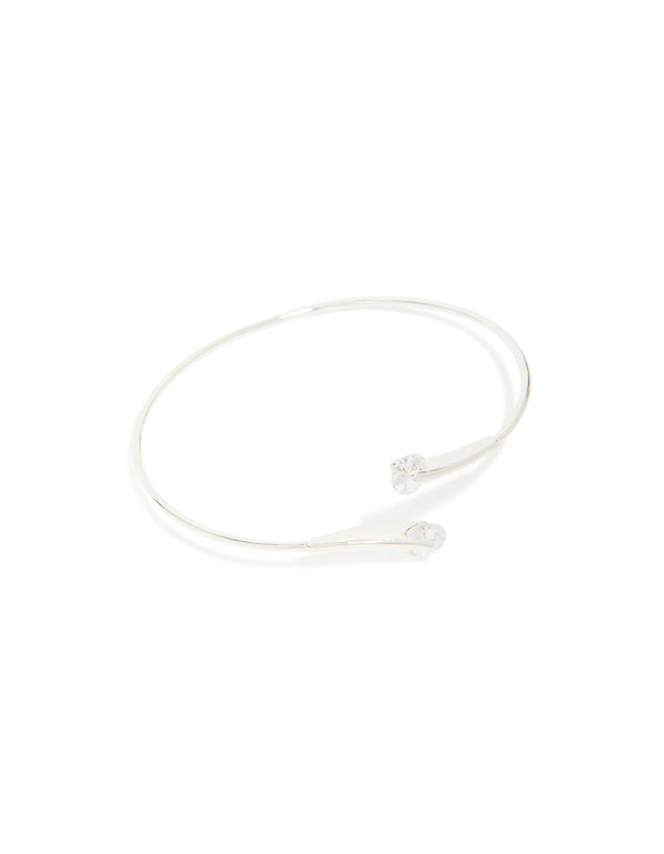 Discover a silver plated cubic zirconia floating wrap around bangle with statement style front view