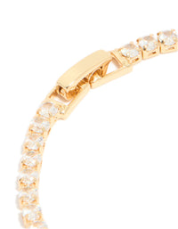 Focused perspective of gold plated cubic zirconia rectangle tennis bracelet showing clasp mechanism closure in detail view - link has visual effect only