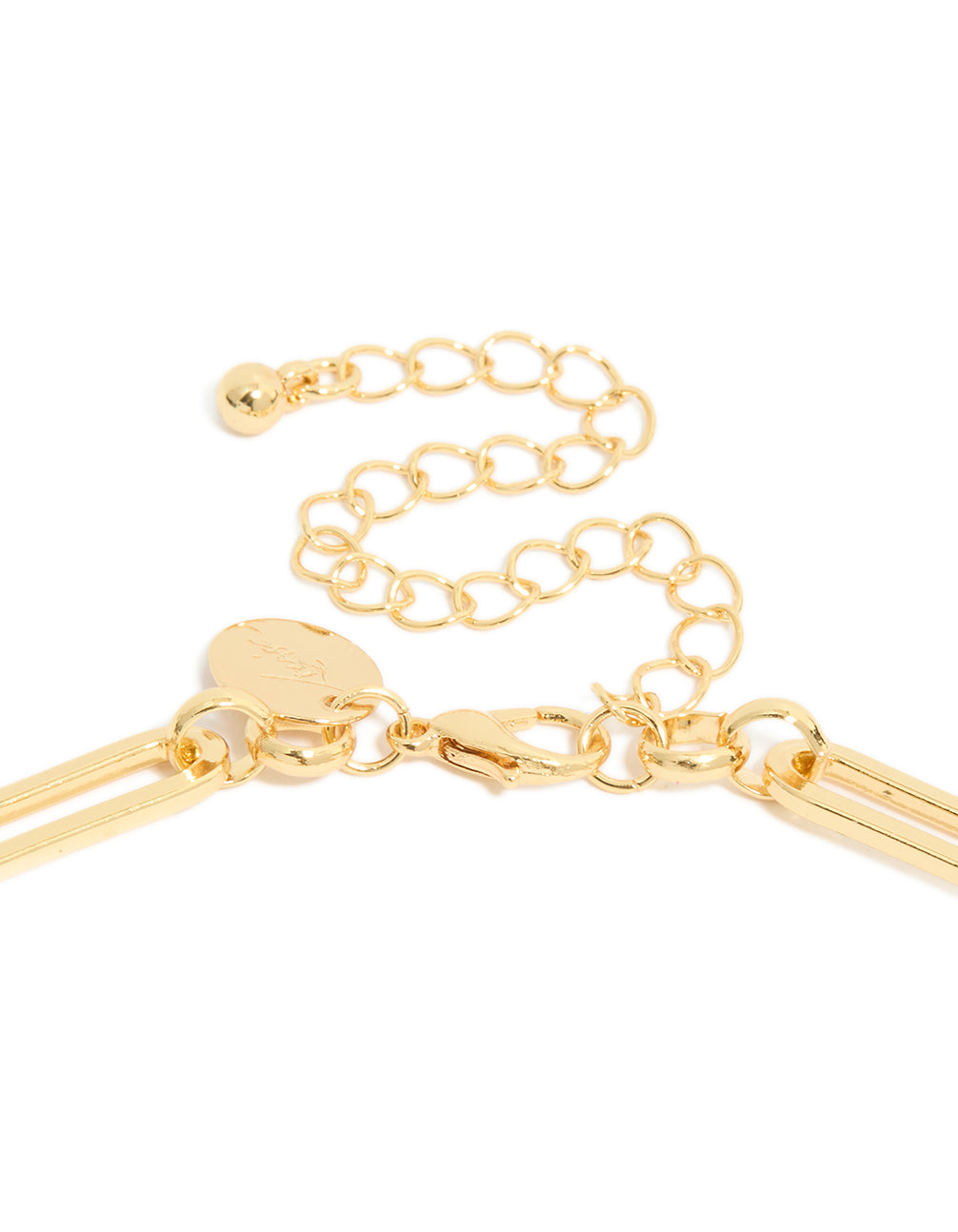 Detailed view of gold plated diamante bezel teardrop chain necklace clasp detail view