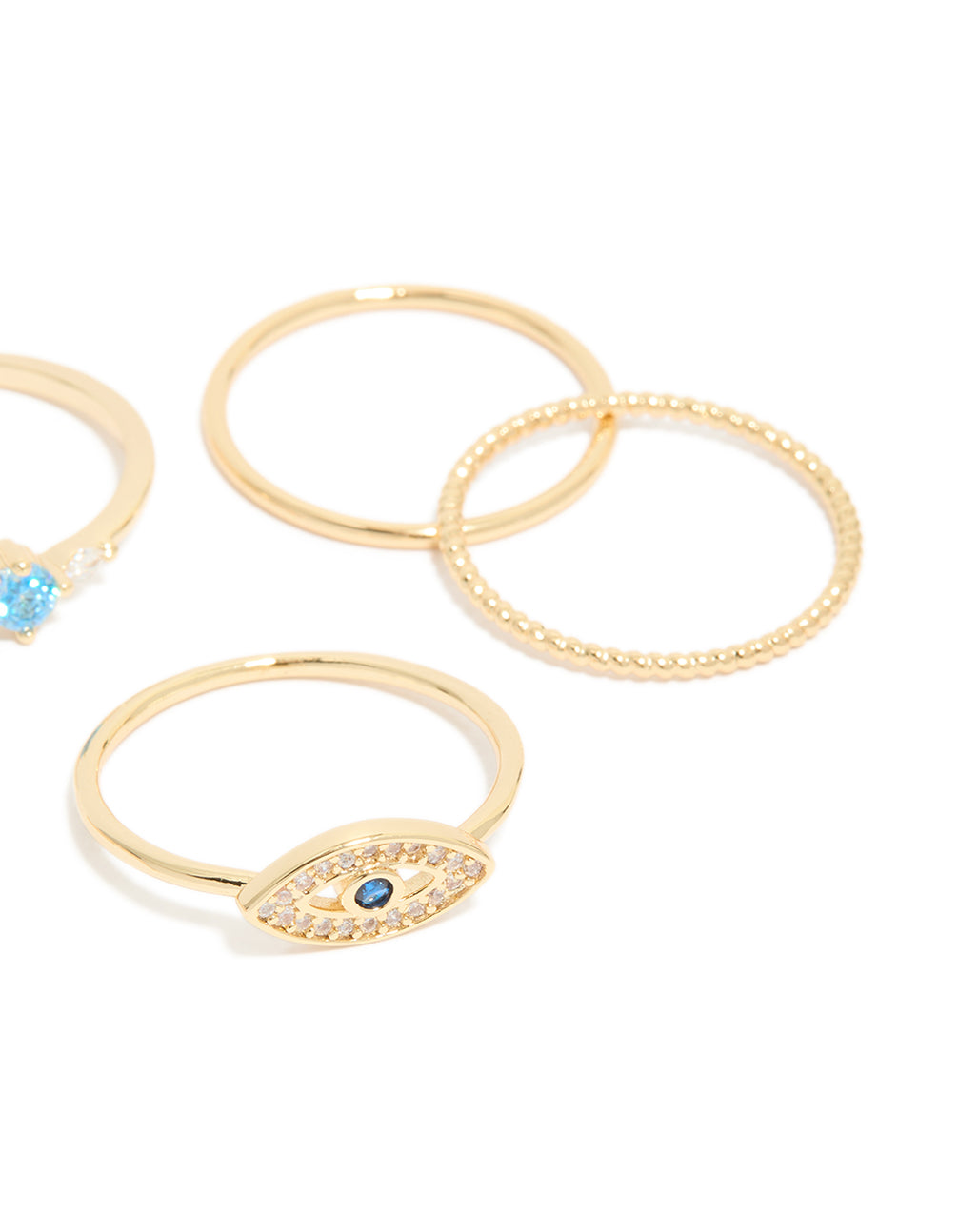 Crafted from gold plated material, this cubic zirconia and evil eye rings 5-pack features with crystal accents side view