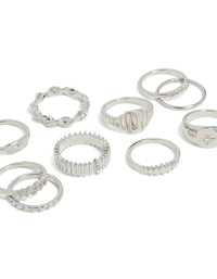 Explore silver signet ribbed and twist rings 10-pack with celestial star accents in statement design detail view - link has visual effect only