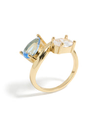 Gold plated ring with clear and blue cubic zirconia front view - link has visual effect only