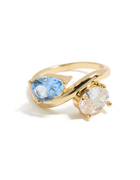 Gold plated ring featuring clear and blue cubic zirconia side detail view - link has visual effect only