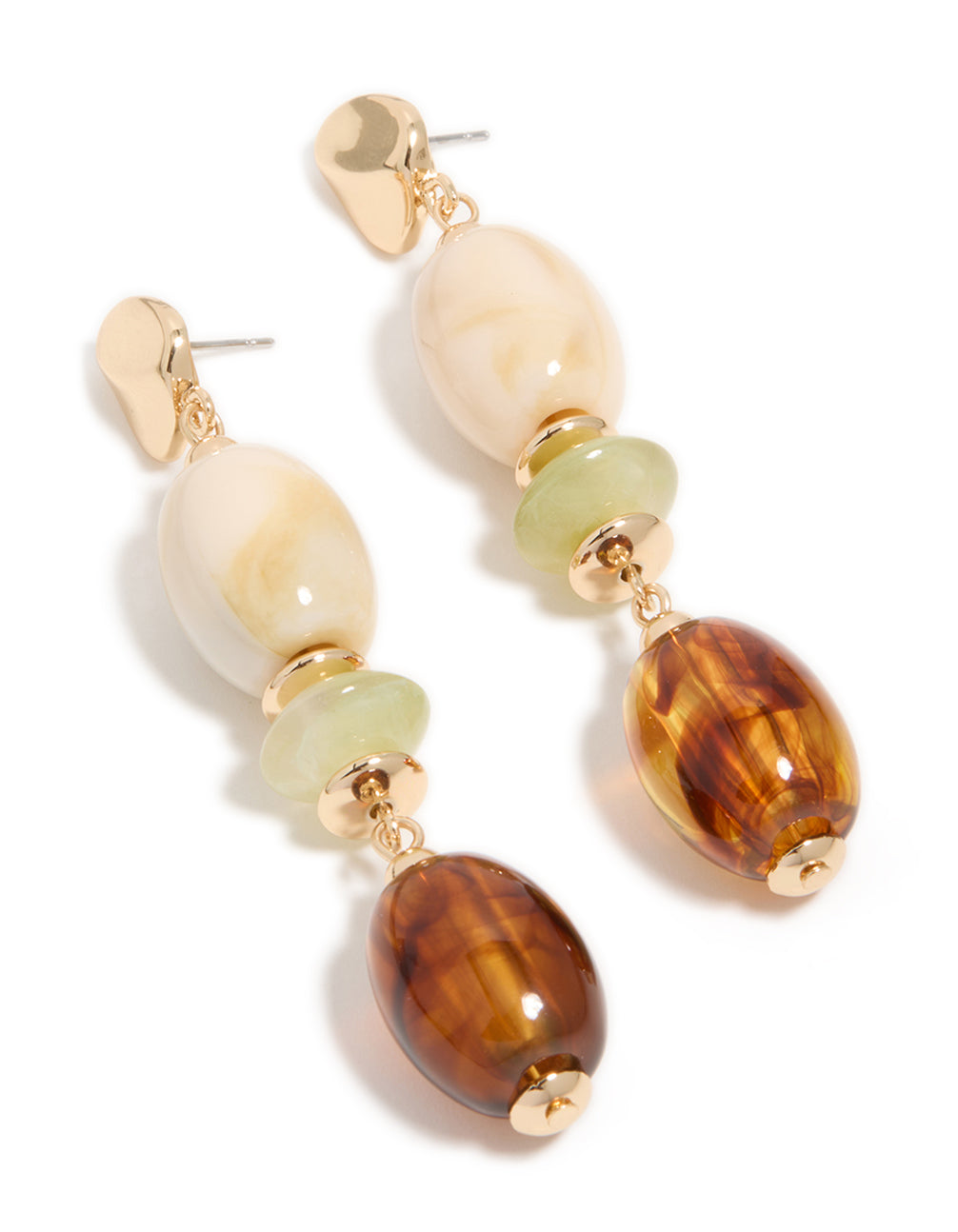 Featuring gold and acrylic mixed size beaded drop earrings with ivory and pale green tones front view