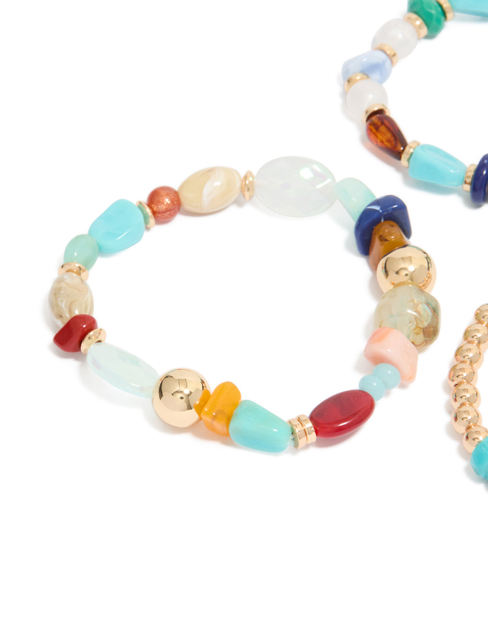Crafted multicoloured beaded irregular shape bracelets in a 3-pack with turquoise material and gold, blue and white details closure detail view