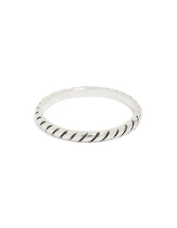 Showcasing a sterling silver textured black enamel statement ring front view - link has visual effect only
