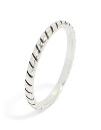 Featuring a sterling silver textured black enamel statement ring side detail view - link has visual effect only