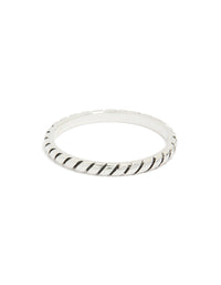 Crafted from sterling silver with textured black enamel in a statement ring close up view - link has visual effect only