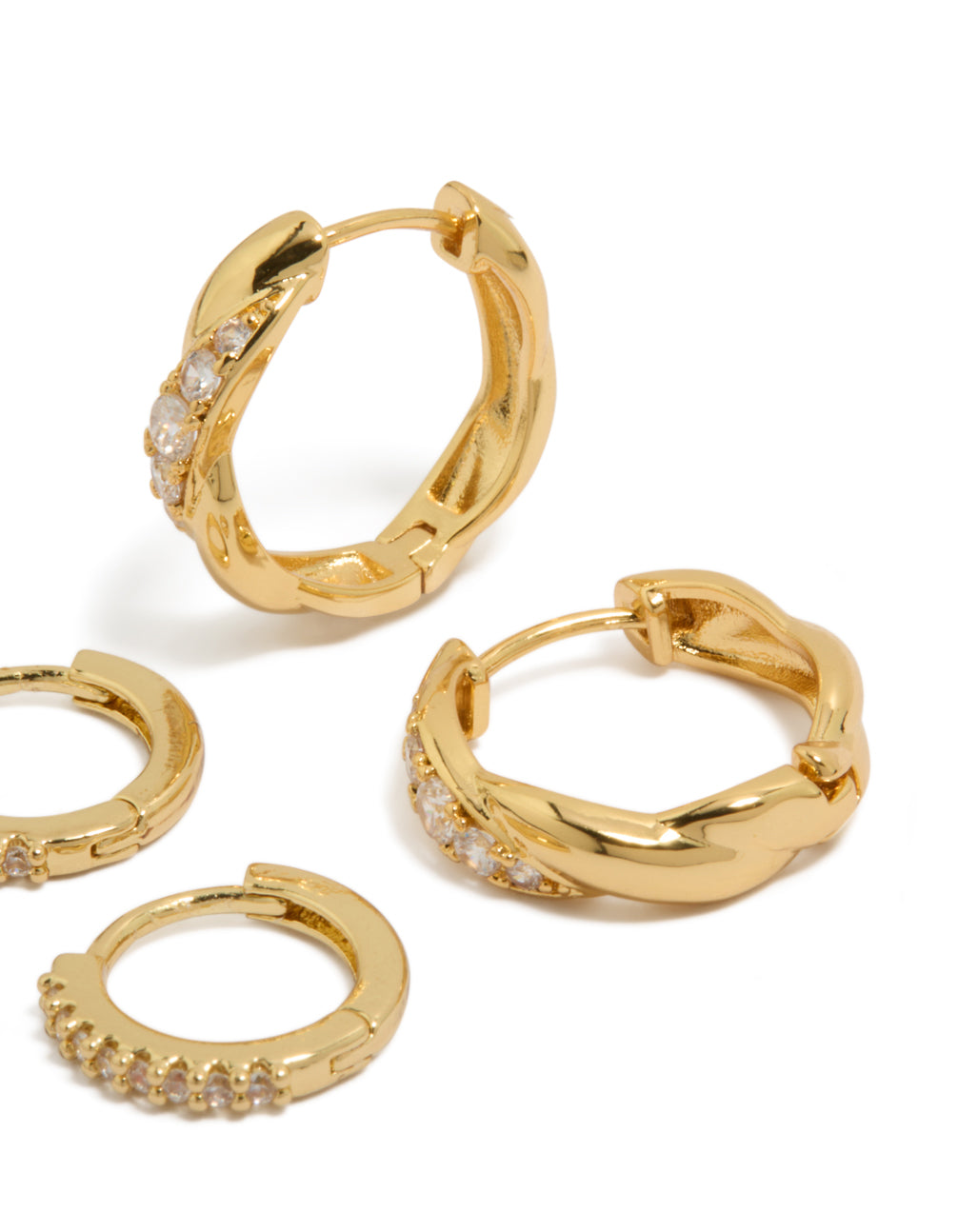 A detailed look at gold plated brass woven and fine cubic zirconia huggie earrings with crystal accents and hoop closure in a 2-pack post detail view