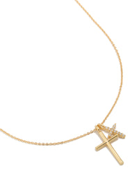 Showcasing a gold plated brass double cubic zirconia cross necklace with charm featuring statement styling close up view - link has visual effect only