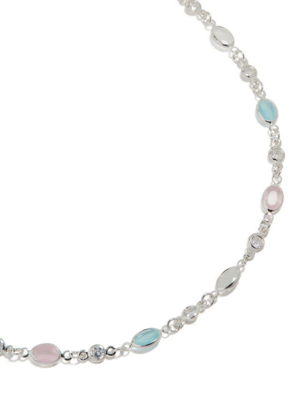 Beautifully crafted silver plated pink and blue cubic zirconia mixed oval necklace with close up view