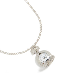 Crafted in silver, this long watch pendant necklace features floral locket details and stainless steel in a statement style close up view - link has visual effect only