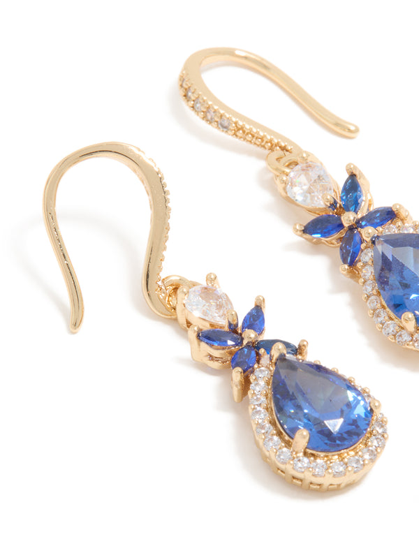 Detailed gold blue cubic zirconia flower drop earrings featuring with crystal and statement style close up view