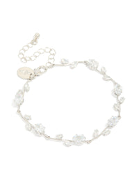 Beautifully crafted dainty bracelet featuring cubic zirconia stones in silver and clear front view - link has visual effect only