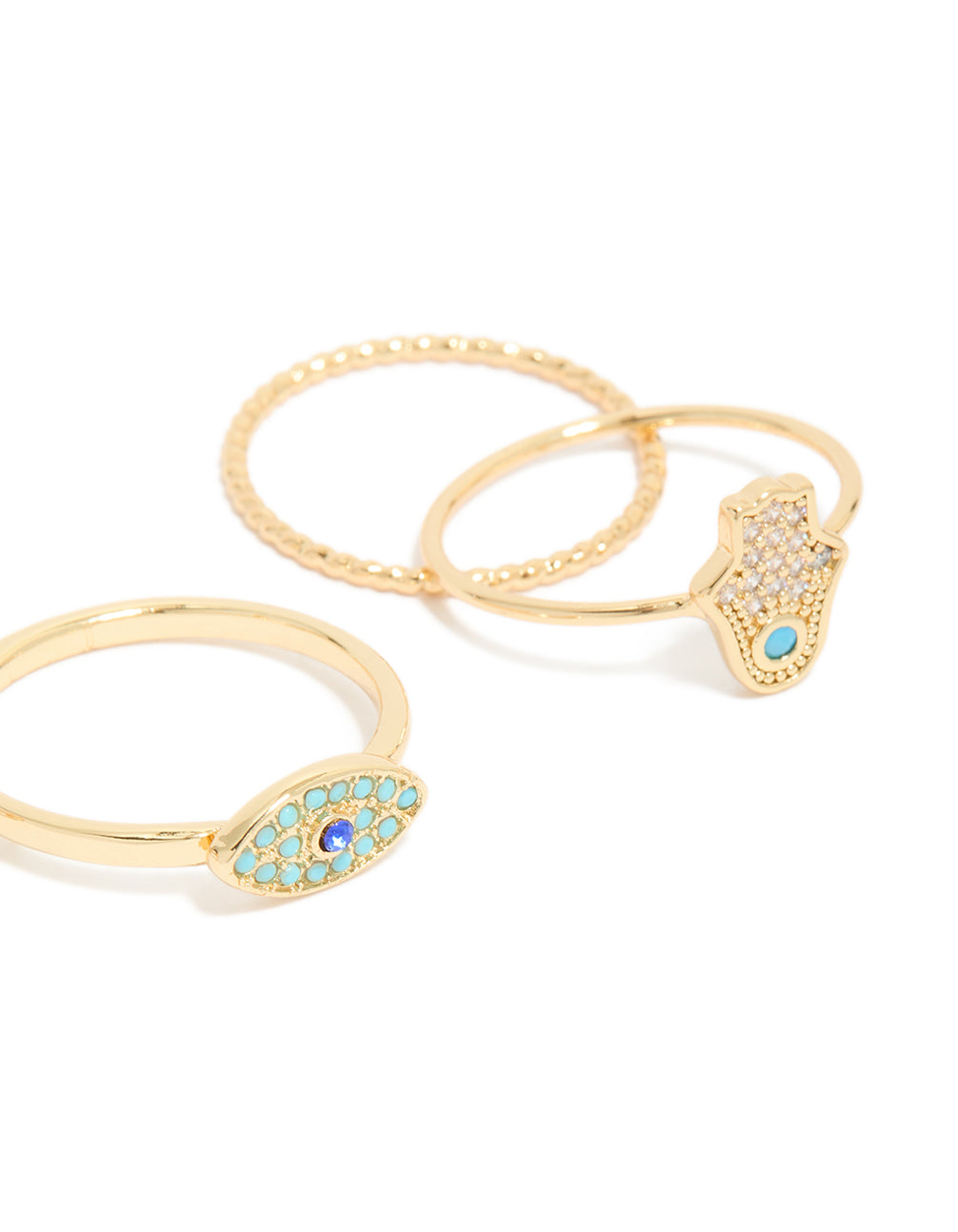 Designed with gold plated cubic zirconia evil eye and hamsa hand rings 4-pack, featuring celestial sun motifs details in crystal and statement style close up view