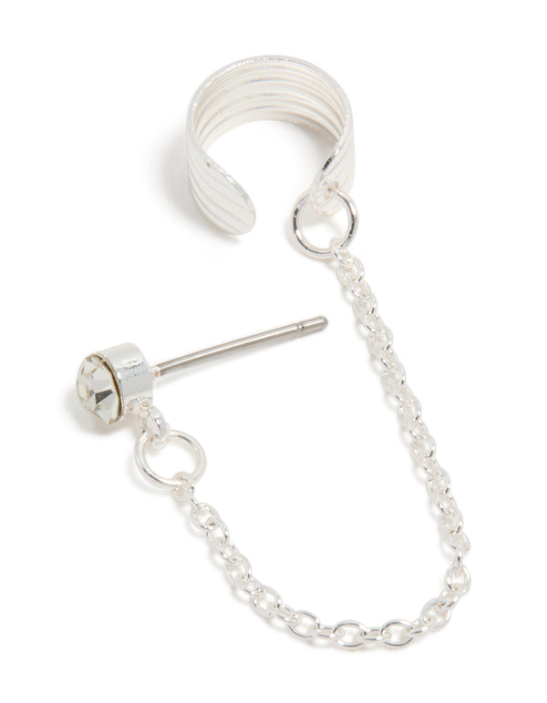 Showcasing a diamante ribbed cuff and stud earring with stud closure in silver front view