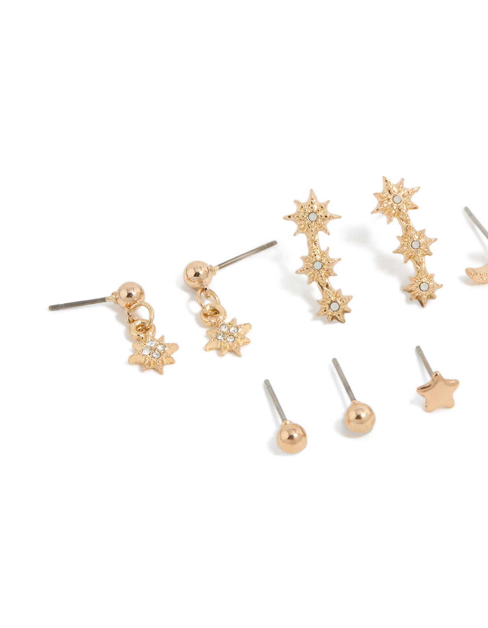 Showcasing gold diamante earrings 7-pack featuring ball star and moon designs with glitter accents and stud closure close up view