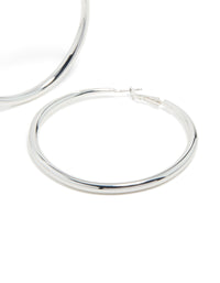 Presenting silver plated dome hoop earrings with closure post detail view - link has visual effect only